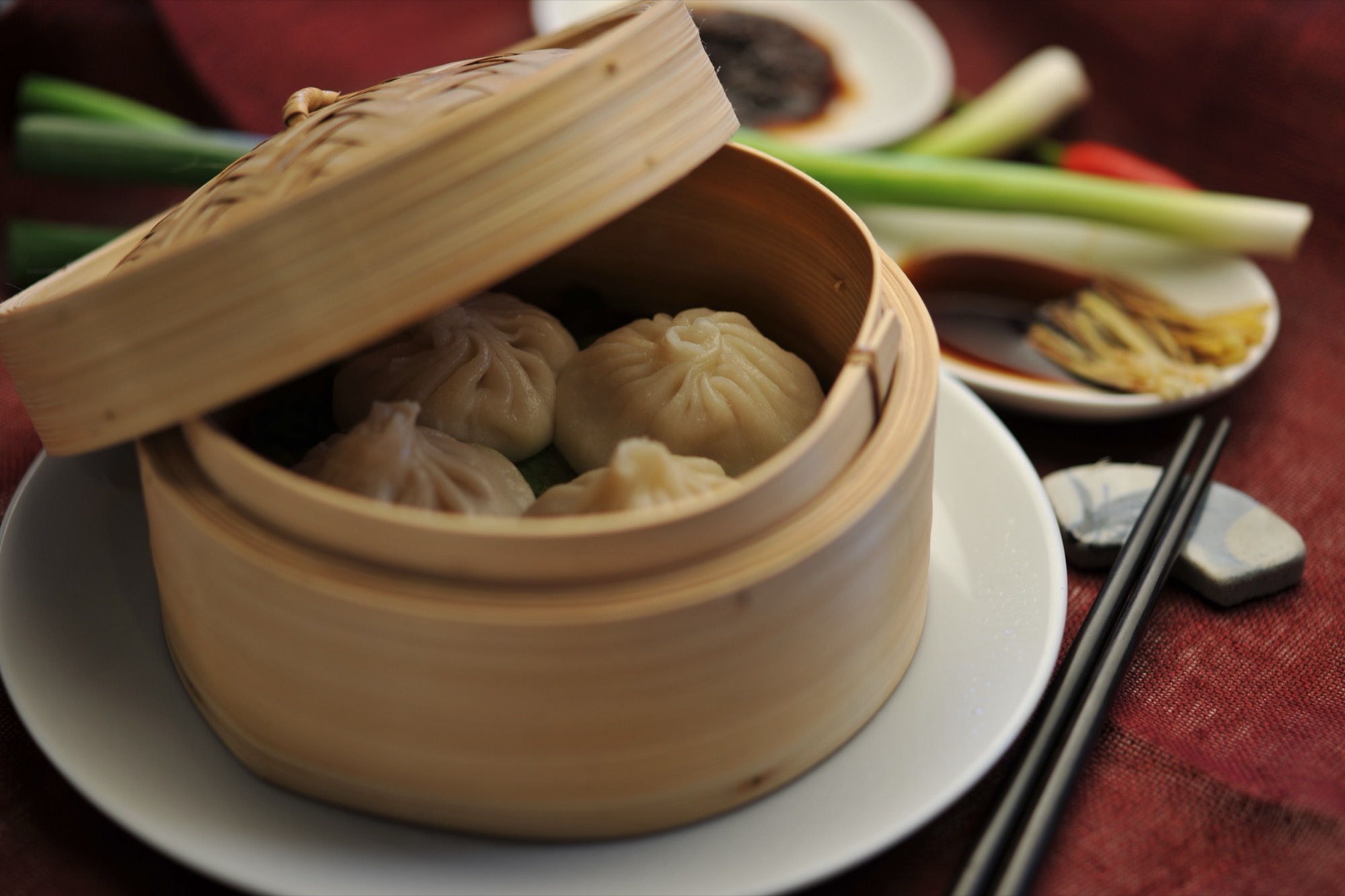 Shanghai xiao long bao in a bamboo steamer